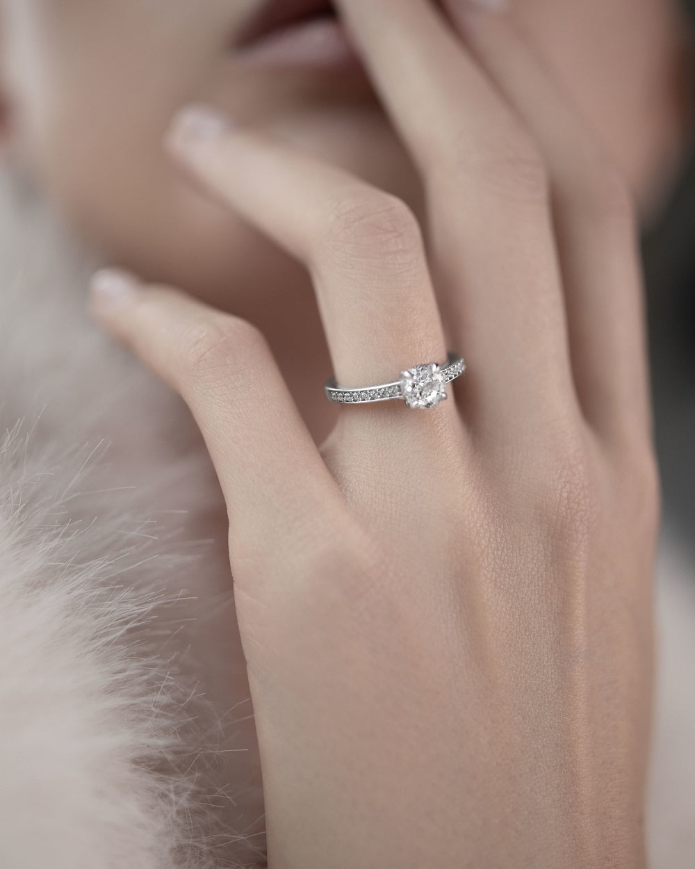 Ring with a stone in a circle cut