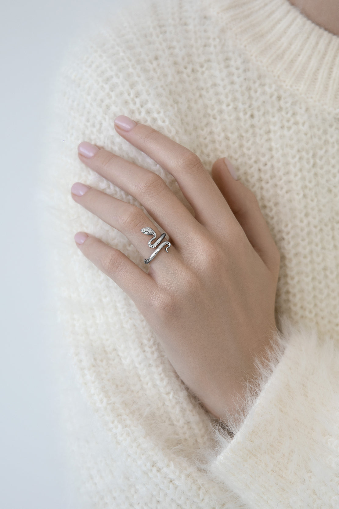 Snake ring with green stones