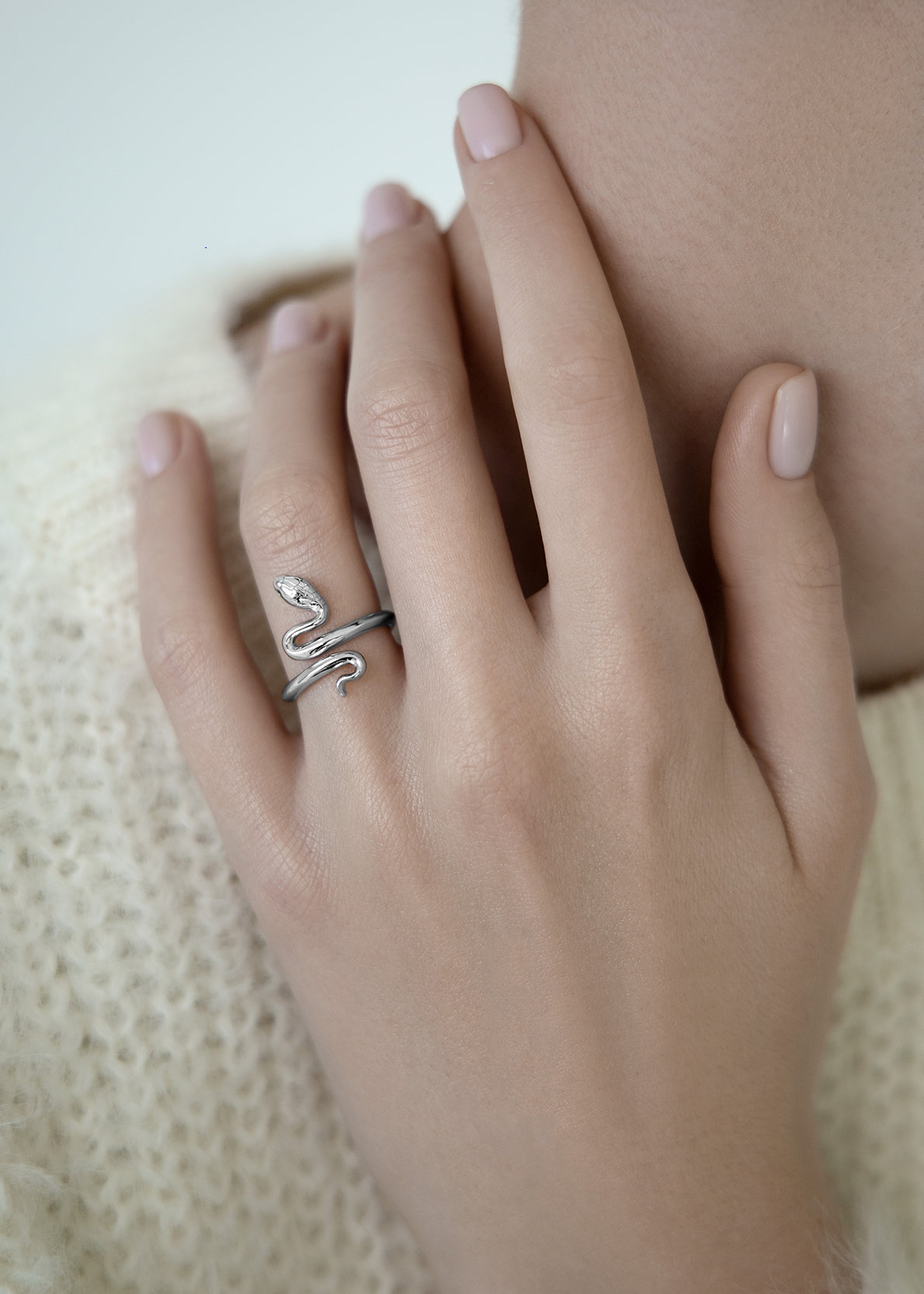 Snake ring with green stones