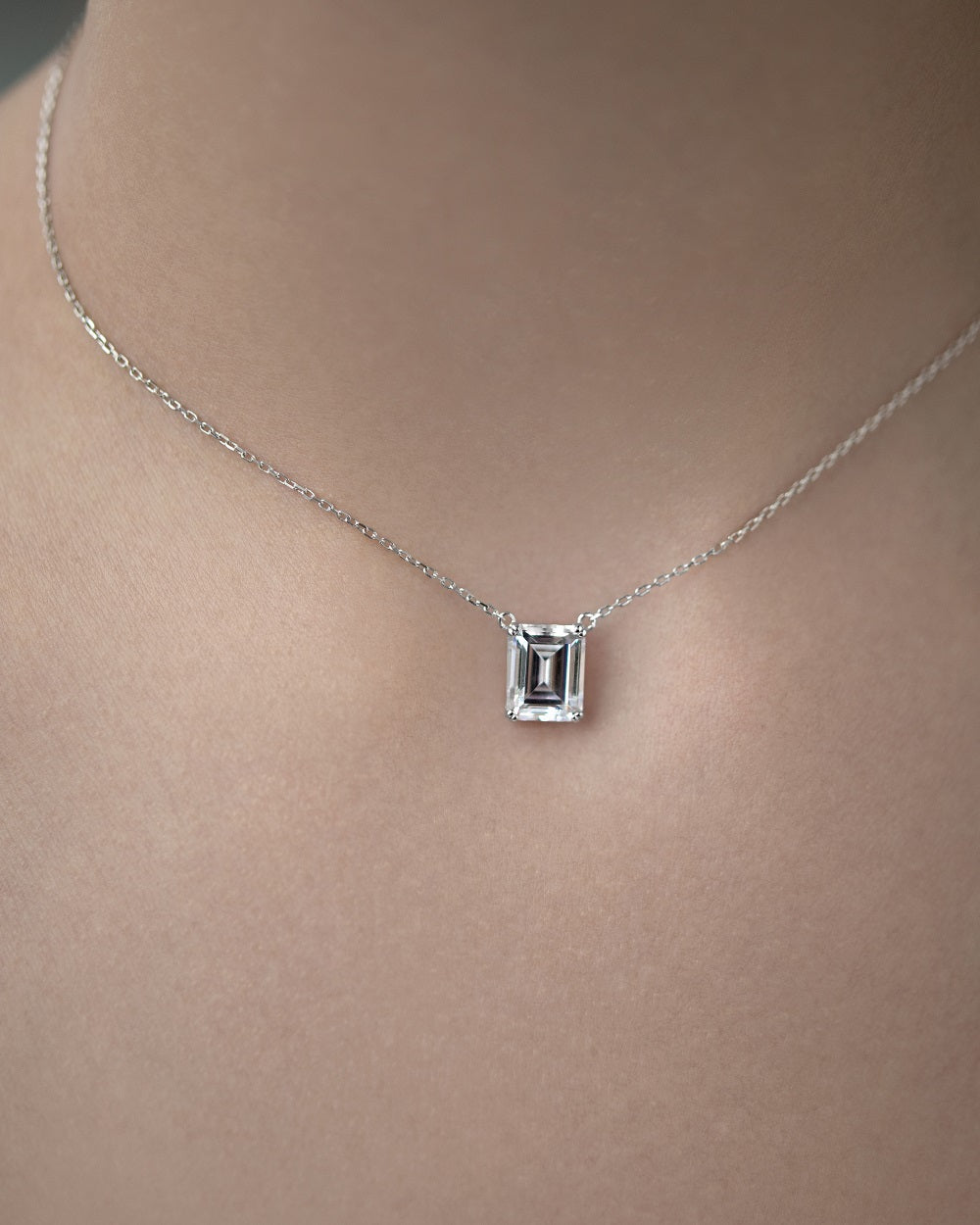 Necklace with a stone in a baguette cut