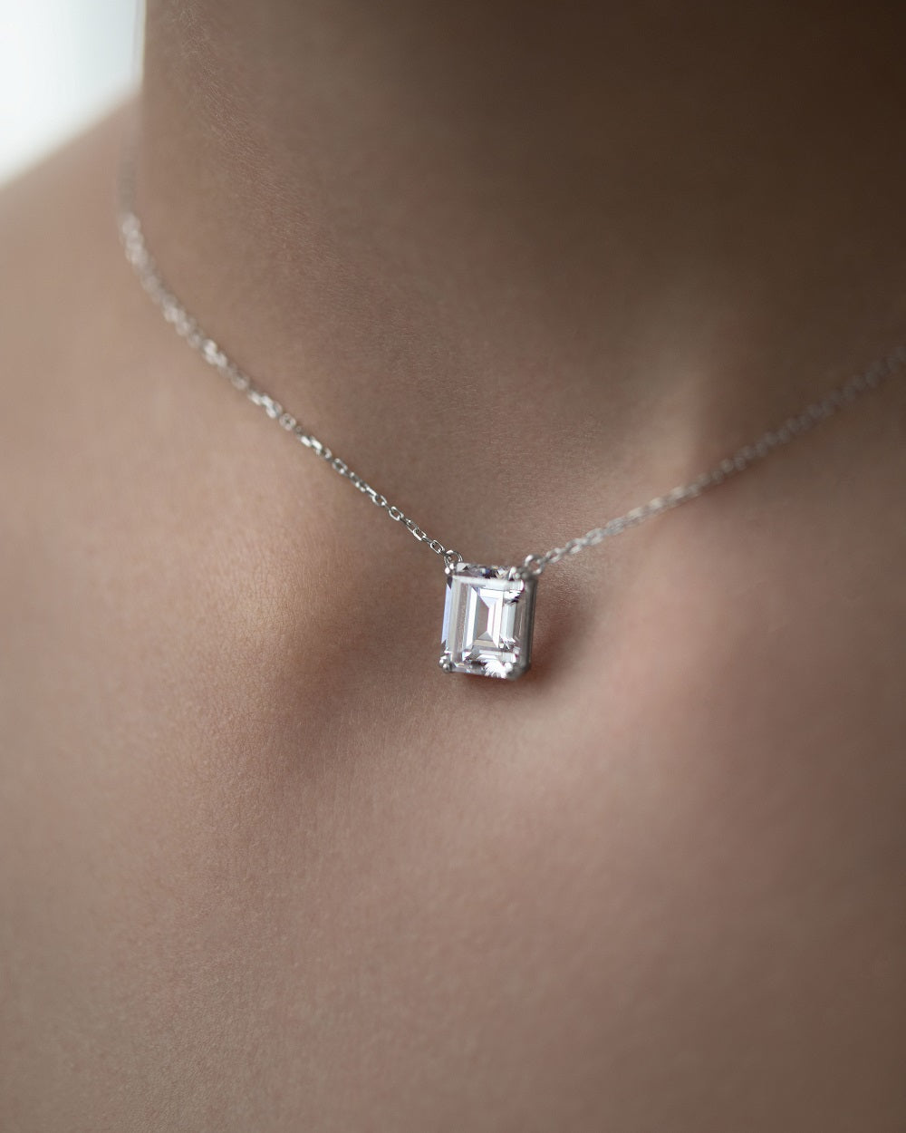 Necklace with a stone in a baguette cut