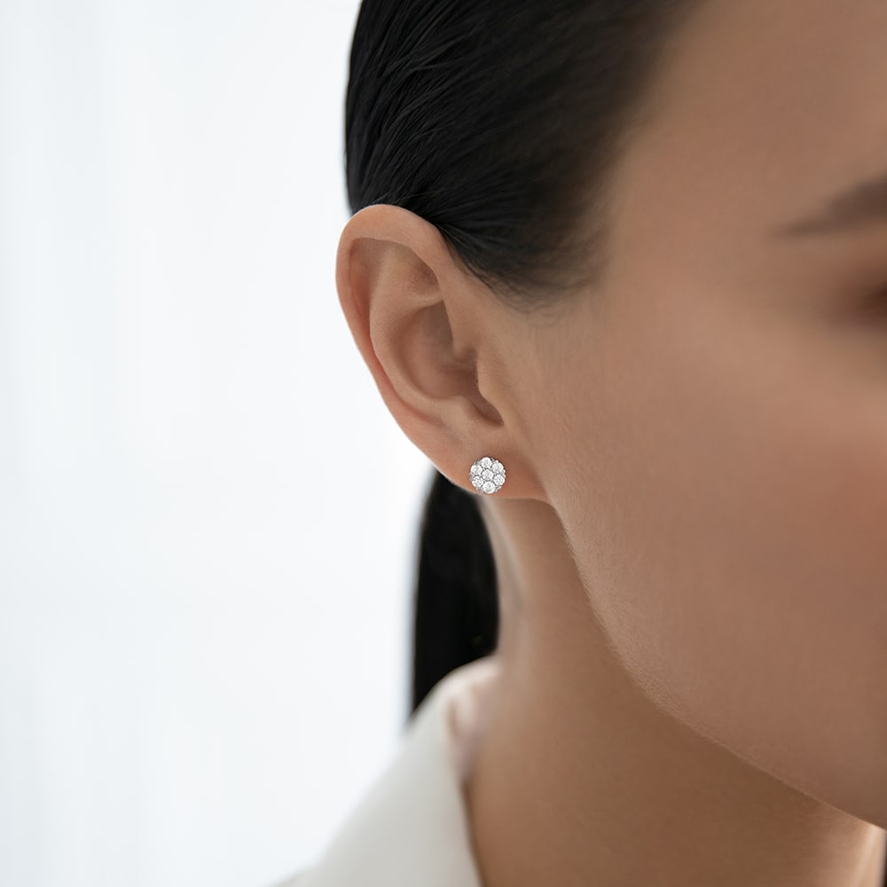 Stud earrings with a scattering of cubic zirconia