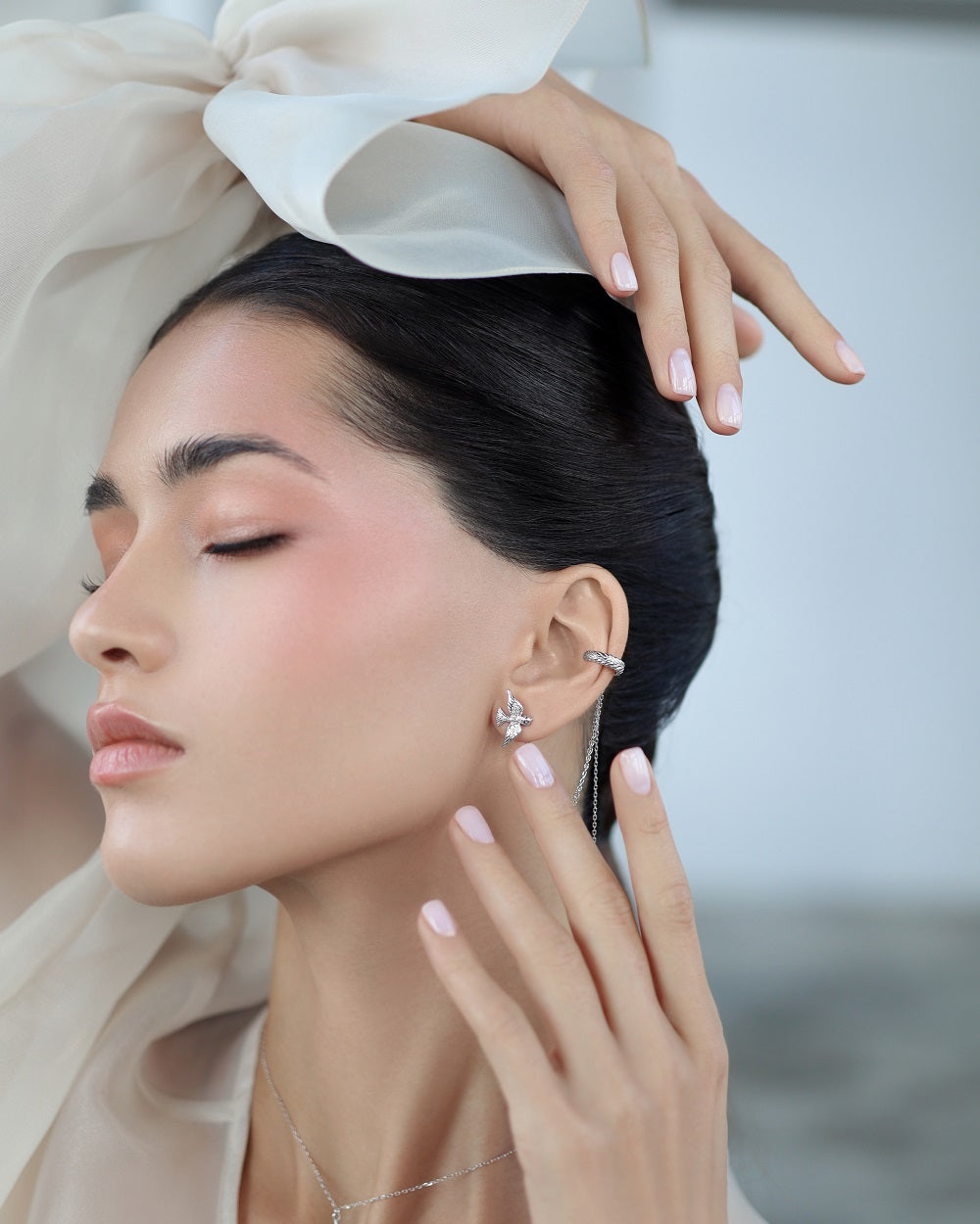 Cuff and stud earring Swallow