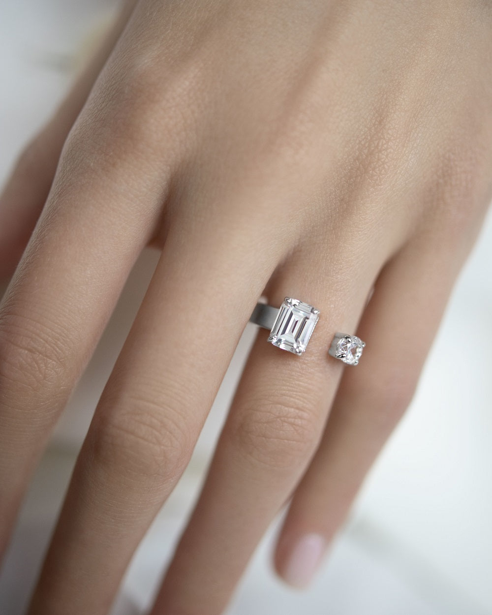 Ring with stones in a baguette and circle cut