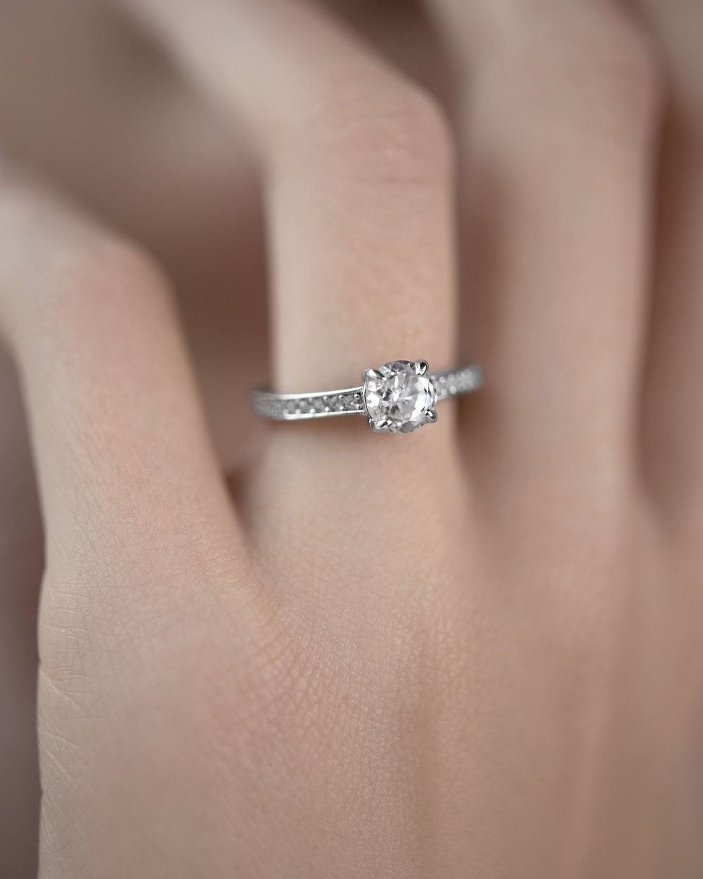 Ring with a stone in a circle cut