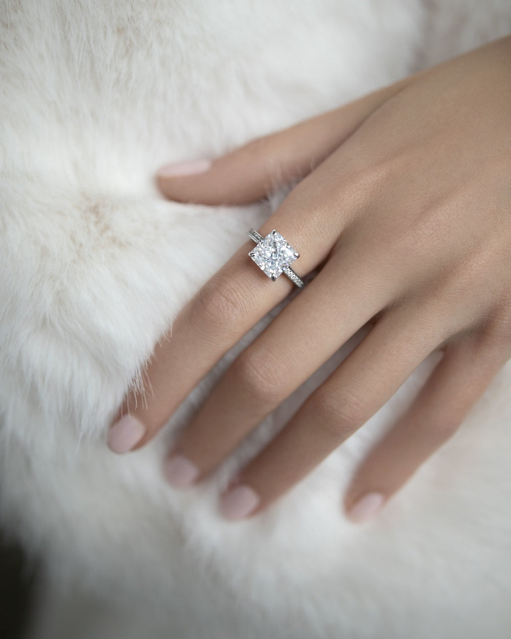 Ring with a stone in a princess cut