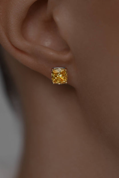 Earstuds with yellow Cubic Zirconia Princess cut