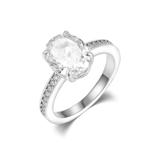 Ring with a stone in an oval cut