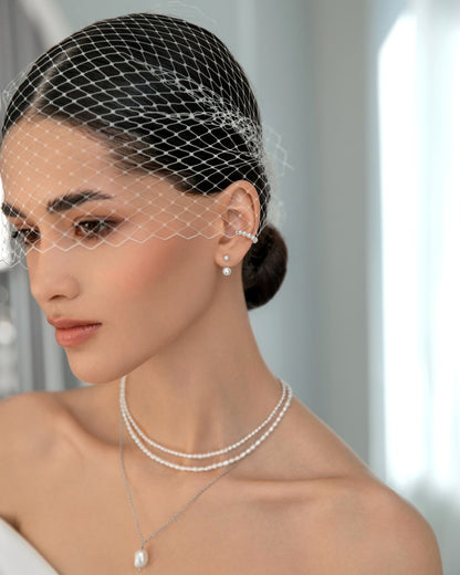 Pearl earrings-jackets