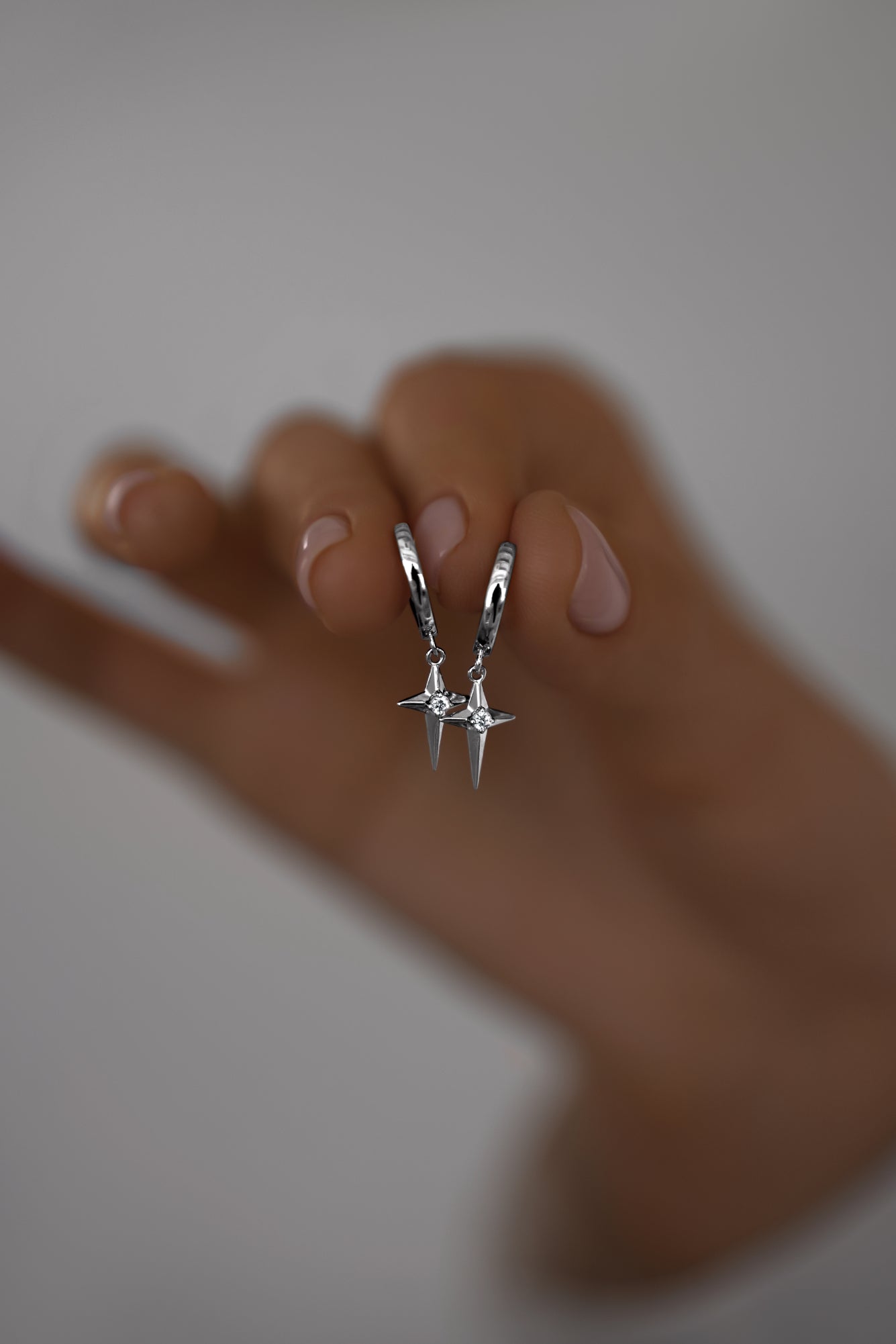 Earrings Polar star on huggies lock