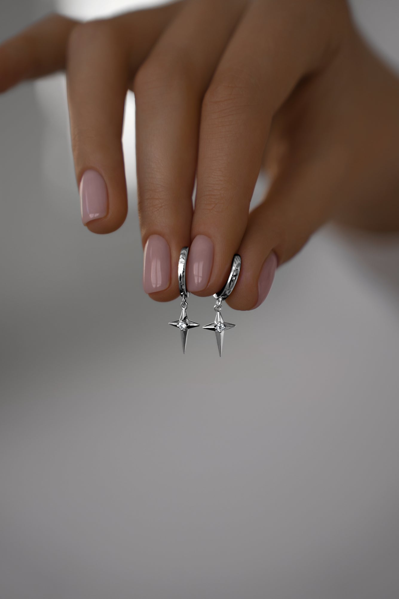 Earrings Polar star on huggies lock
