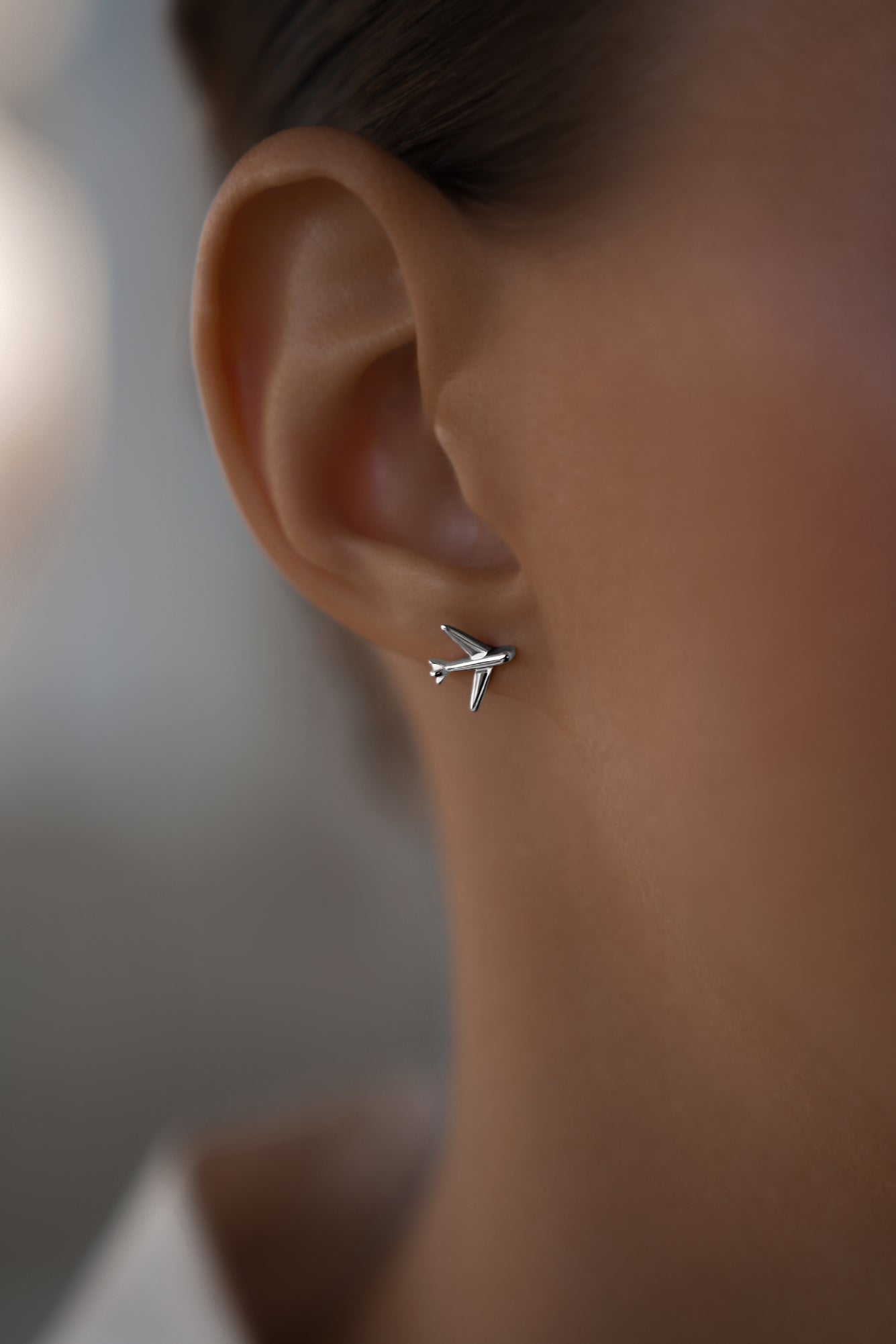 Earstuds Jet to the clouds