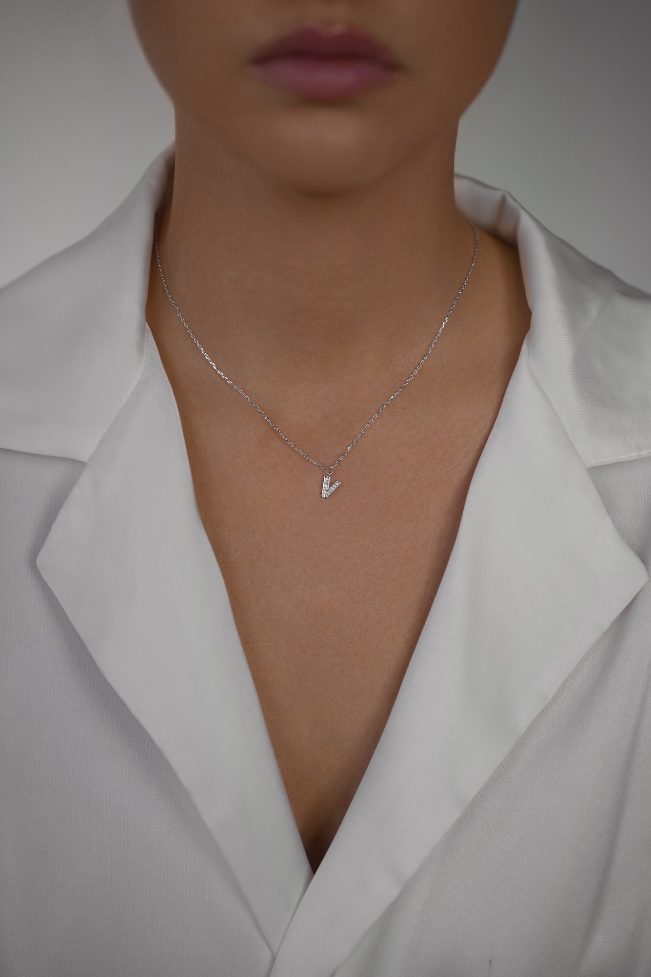 Necklace with letter V