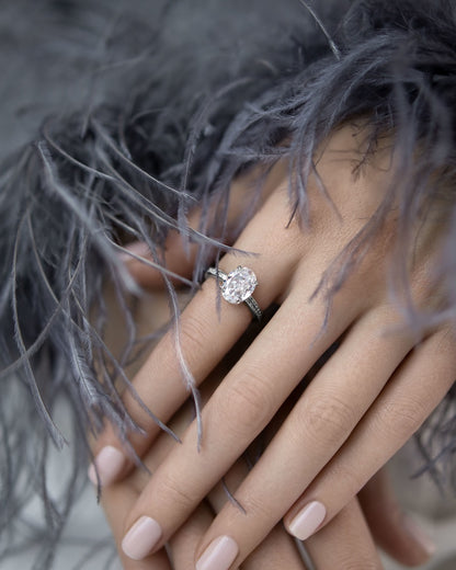 Ring with a stone in an oval cut