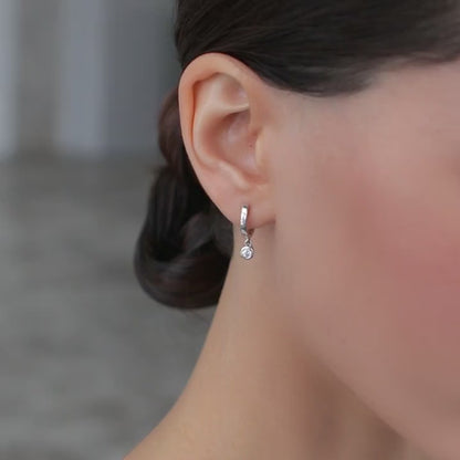 Huggies-earring with a hanging cubic zirconia