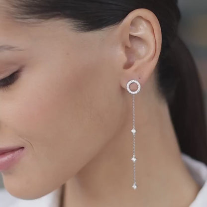 Circle earrings with pendant part