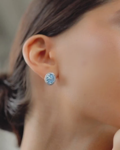 Earrings with blue stone