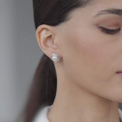 Stud earrings with river pearls