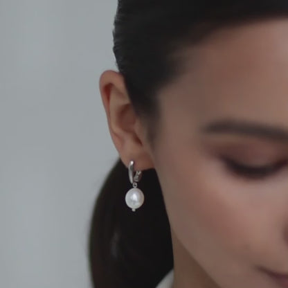 Earrings with Baroque pearls on an English lock